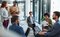 group of employees conversing 